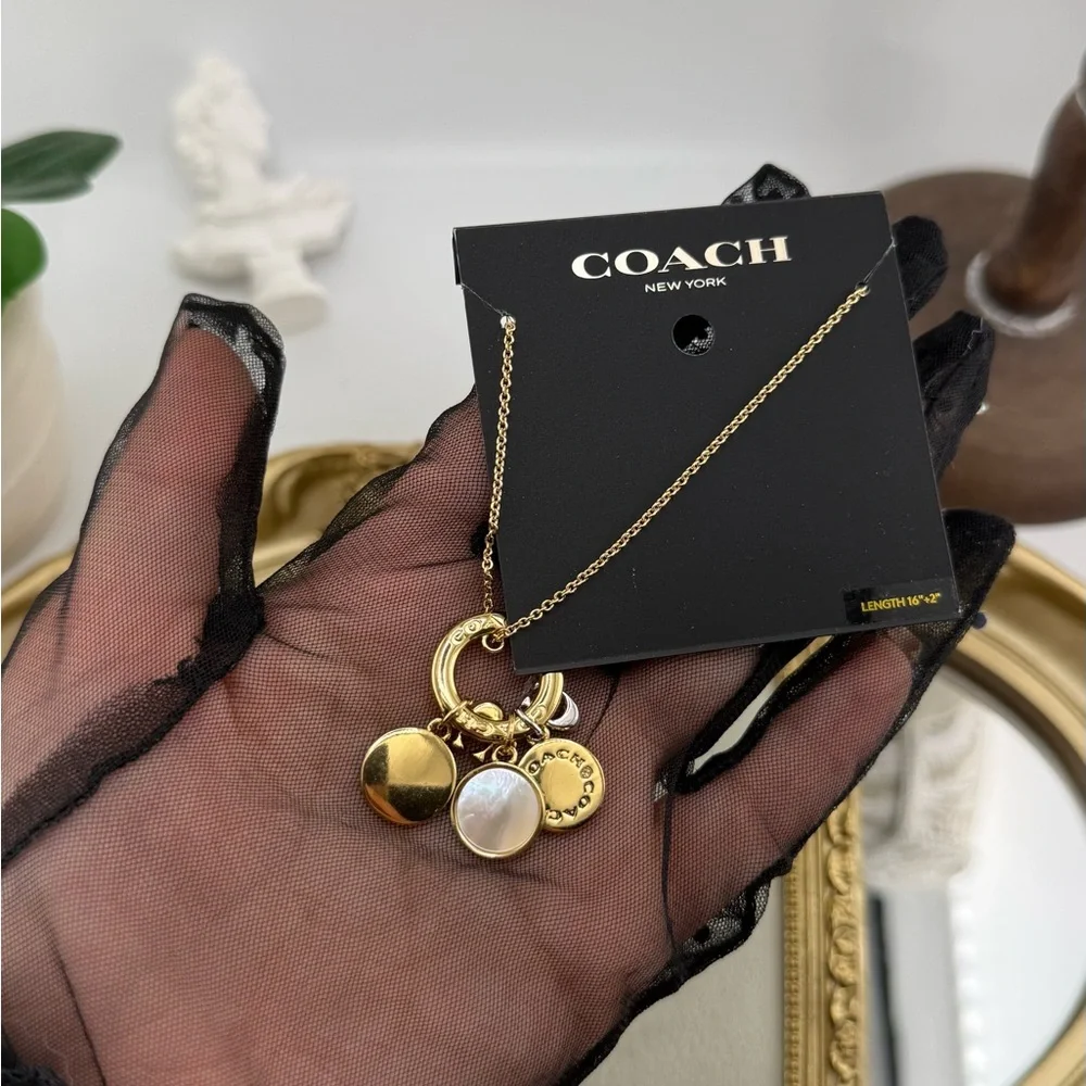 COACH New York Gold Charm Pendant Necklace – NWT - Picture 5 of 7